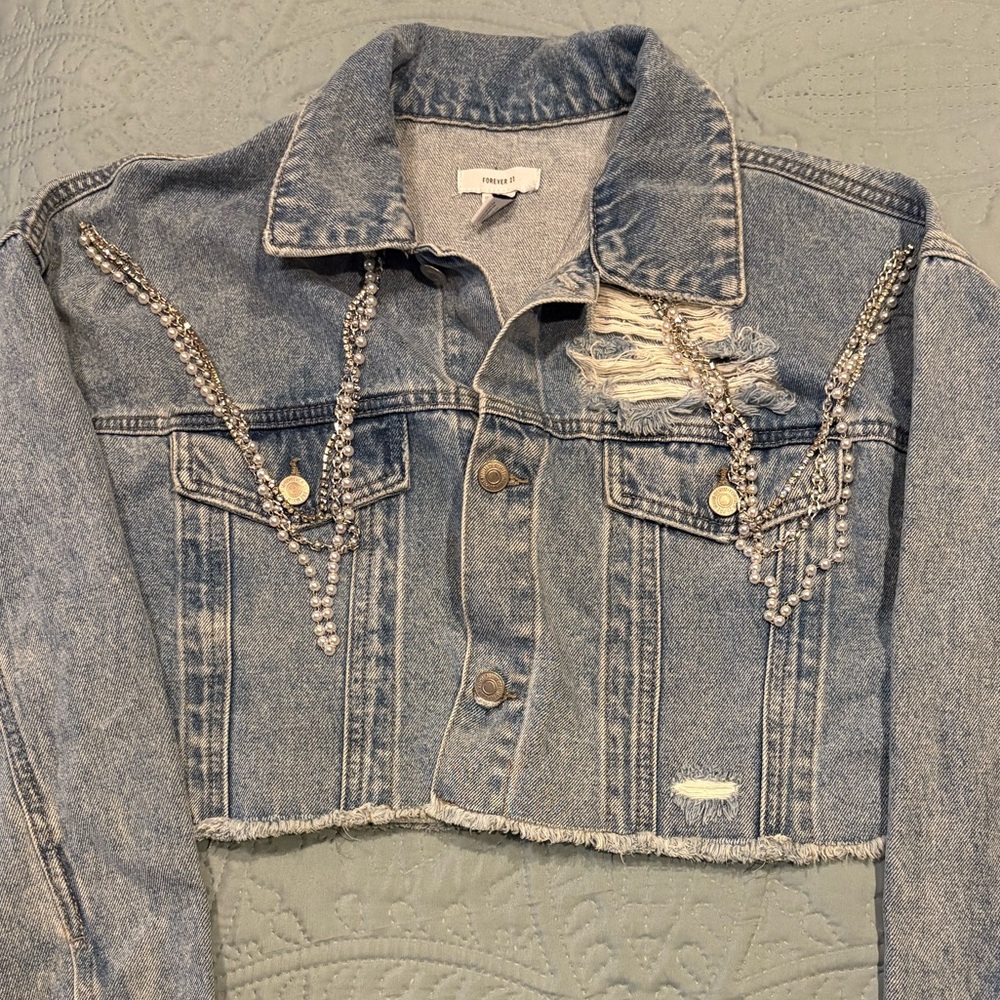Decorative cropped denim jacket. Light wear